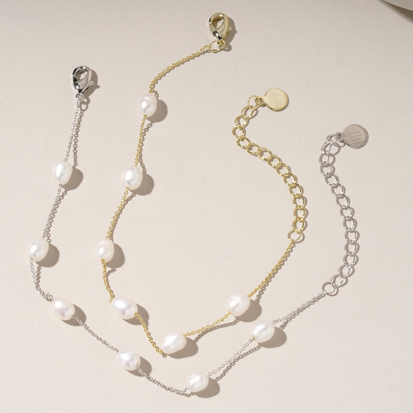 Bride wearing WAAWEES water-resistant gold necklace with pearl pendant, styled for wedding day.