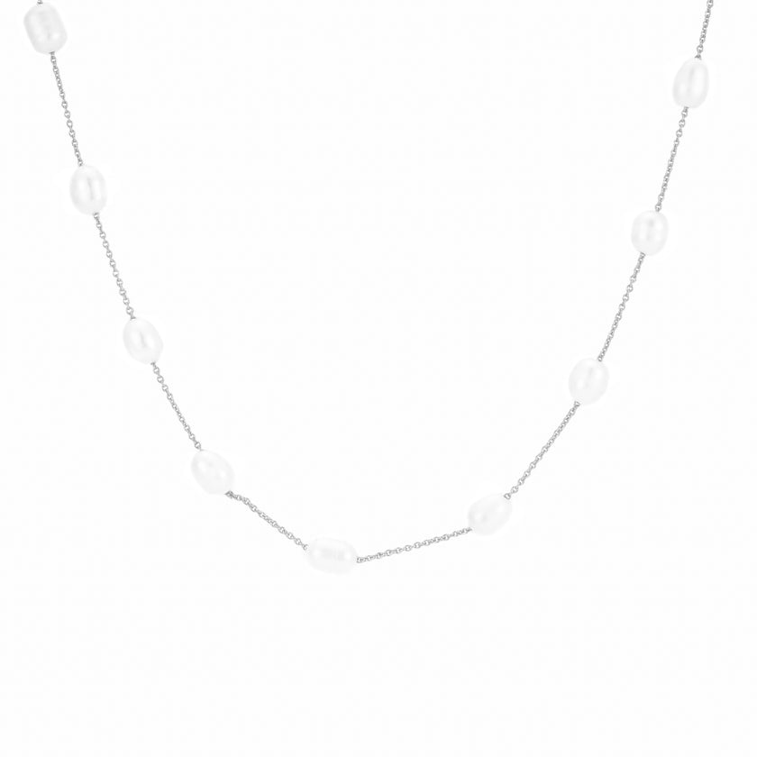 Bride wearing WAAWEES water-resistant gold necklace with pearl pendant, styled for wedding day.