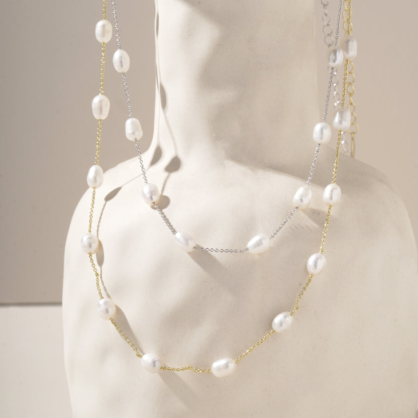 Bride wearing WAAWEES water-resistant gold necklace with pearl pendant, styled for wedding day.